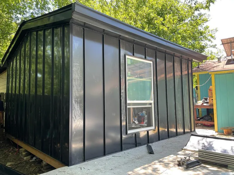 Black standing seam metal wall panels for Metal Roof Installation in Jefferson