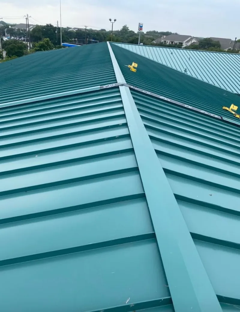 Green commercial metal roof ridge and valley for Metal Roof Repair in Jefferson